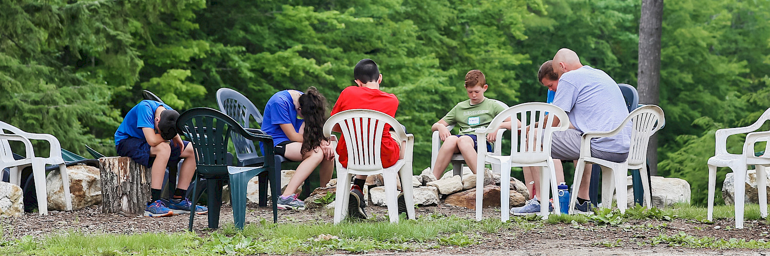Family Camp - family praying